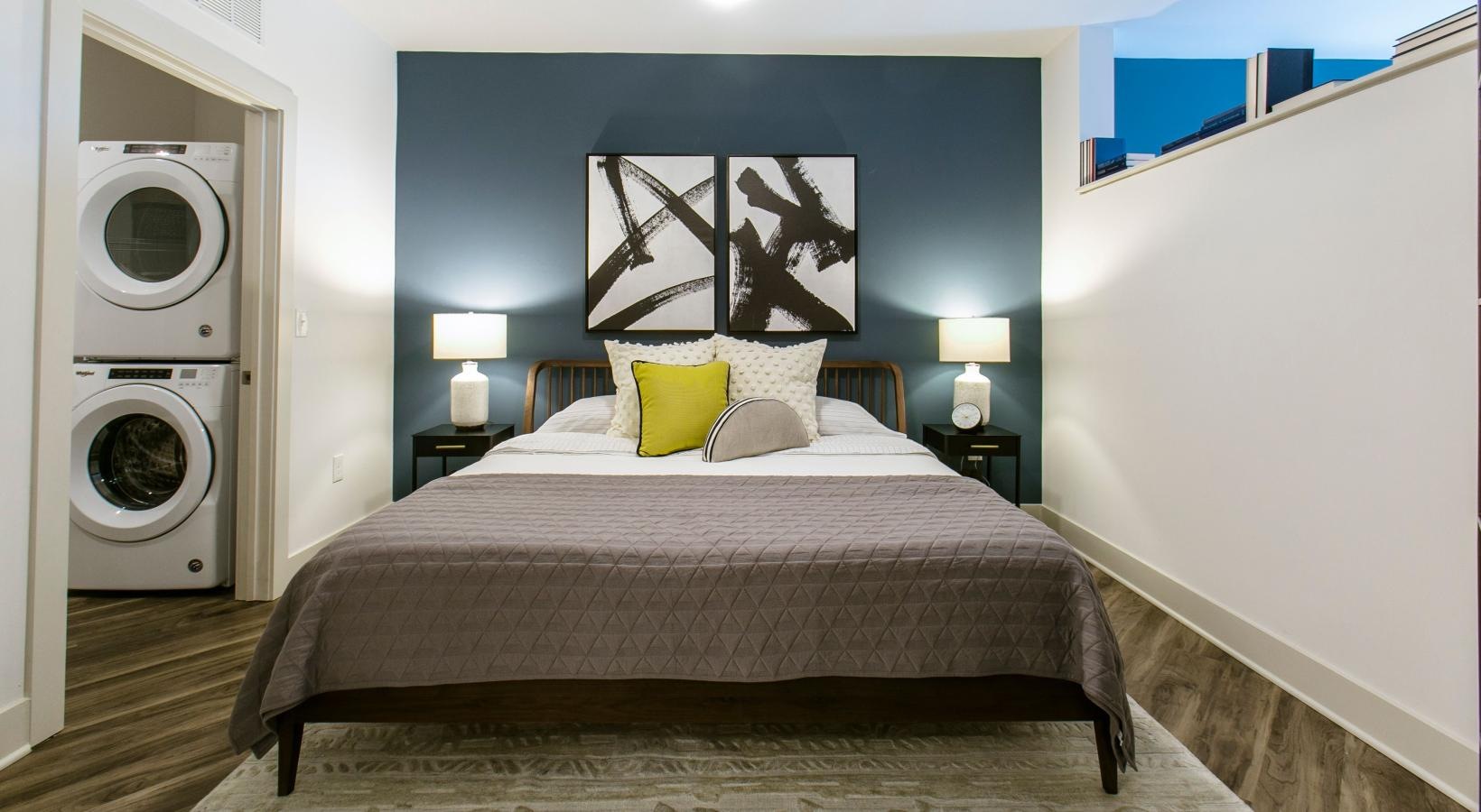 Bedroom options to fit every lifestyle a bed with a large painting on the wall