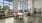 a clubroom with tables and chairs
