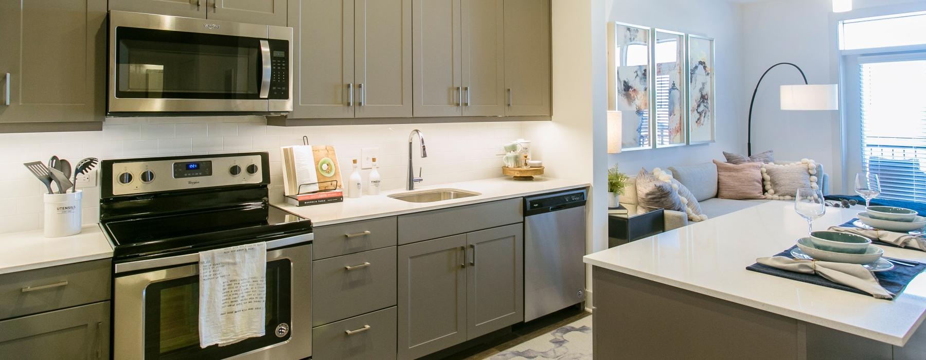 a kitchen with white cabinets