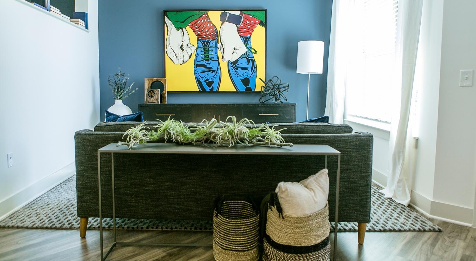 The essence of exceptional living a room with a table and a painting on the wall